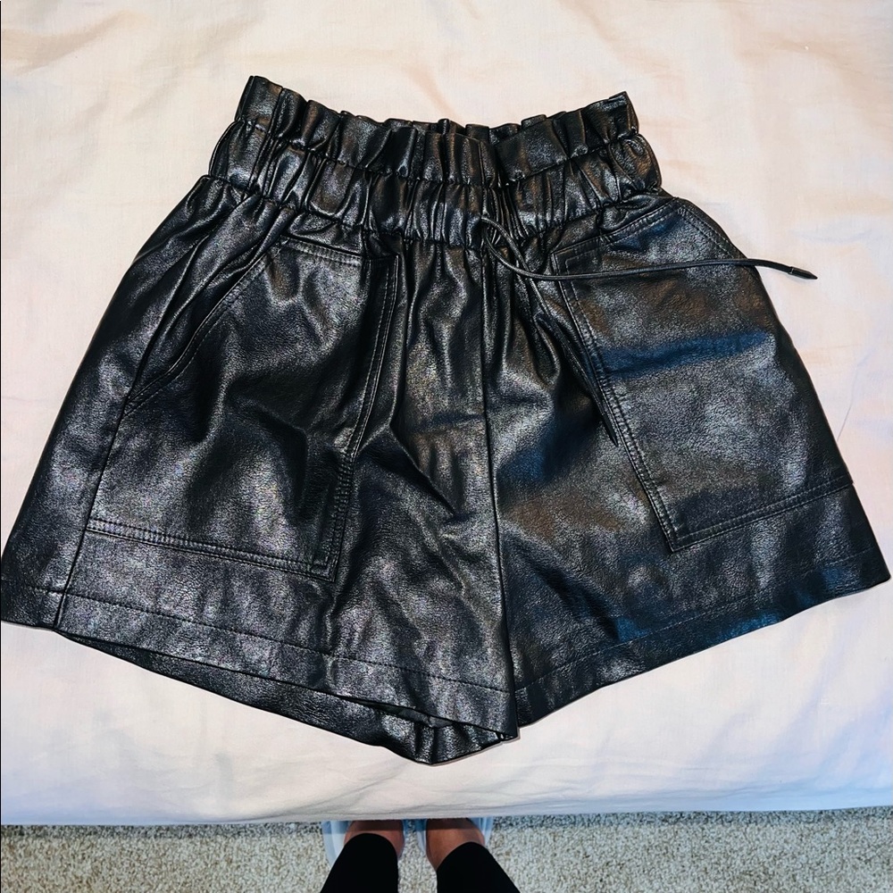 Collection of leather shorts and two leather skirts